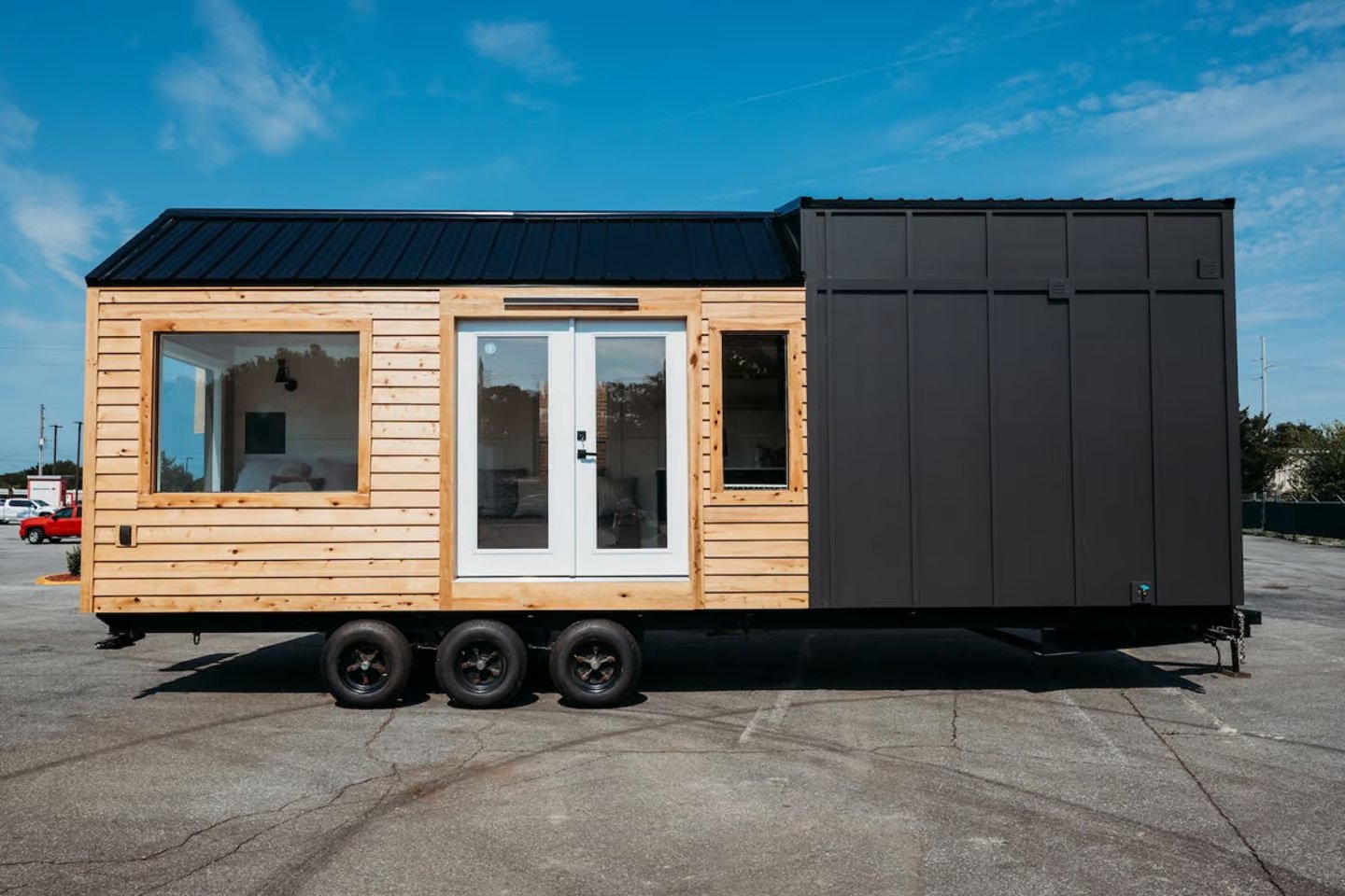 Spacious 224 Sq Ft Tiny House with Light-Filled offers One-Level Living