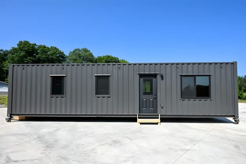 Shipping Container Tiny House: A Flexible Home with Space for People and Vehicles