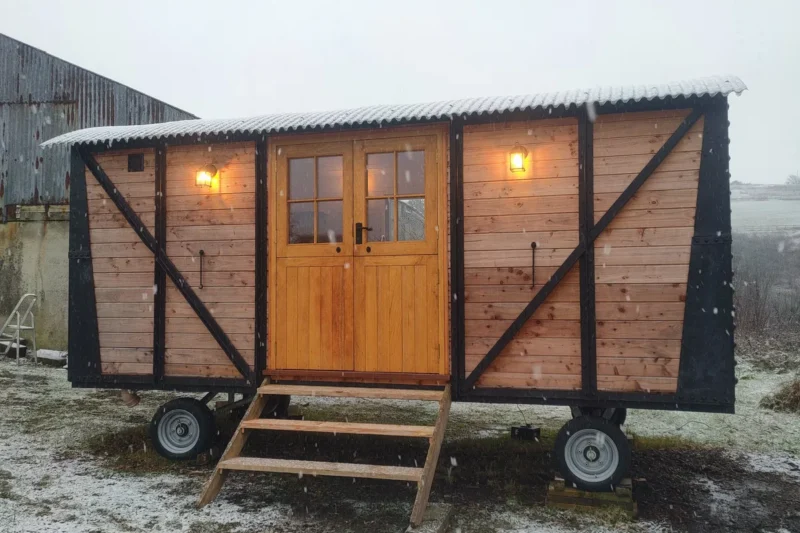 DIY Tiny House Made From Vintage Railroad Car Inspires Off-Grid Living